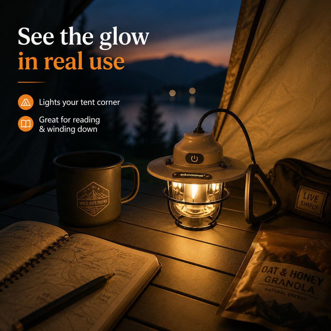 A glowing lantern with a warm light is placed on a wooden camping table inside a tent, with a mug, notebook, granola bag, and other camping items around it. Text on the image reads 'See the glow in real use' and highlights features like lighting the tent corner, reading, and winding down.